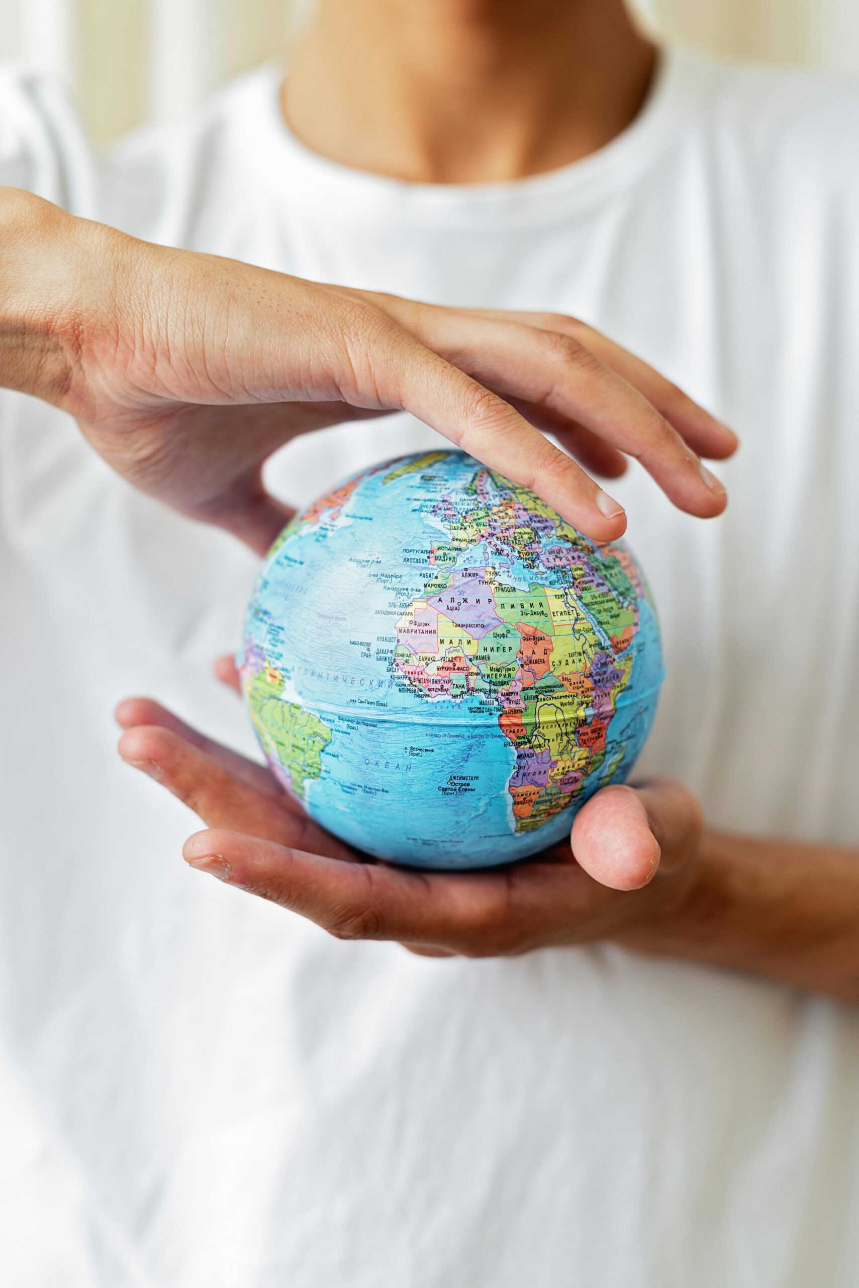 WordPress Security 5 radiantweb post hero image "Loading at the Speed of Light: The Beauty About CloudFlare" . a world globe being held in hands. website optimisation